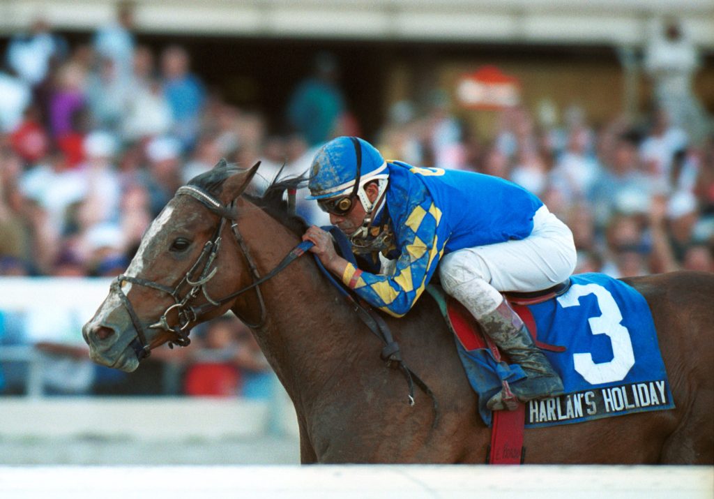 Harlan's Holiday #3 with Edgar Prado riding won the $1,000,000 Florida Derby at Gulfstream Park. 3/16/02. Photo By EQUI-PHOTO.